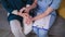 support for older people, female doctor wear blue uniform holds hand of senior grandmother patient during medical visit