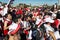 Supporters of the River Plate soccer team sing and dance while waiting for the doors of the stadium to open before a soccer match