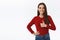 Supportive, upbeat and confident good-looking brunette female in red sweater, showing thumb-up in like or approval, hold