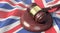Supreme Court - Judge`s gavel lies on the UK flag