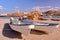 SUR, OMAN - FEBRUARY 7, 2012: Fishing boats in Ayjah with watch towers in background