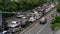 Surabaya, Indonesia - 7 dec 2021 : Cars and motorcycles crossing the road of Ahmad Yani at Surabaya.