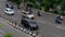 Surabaya, Indonesia - 7 dec 2021 : Cars and motorcycles crossing the road of Ahmad Yani at Surabaya.