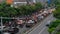 Surabaya, Indonesia - 7 dec 2021 : Cars and motorcycles crossing the road of Ahmad Yani at Surabaya.