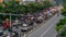 Surabaya, Indonesia - 7 dec 2021 : Cars and motorcycles crossing the road of Ahmad Yani at Surabaya.