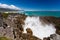 Surf in blowhole Pancake Rocks of Punakaiki, NZ