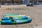 Surf boards and canoe kayak on the beach, sunny spring day. Marina del Rey beach, California USA