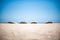 Surf boards idyllic tropical sand clear blue sky sea space for text minimalistic concept vacation relax fun family time