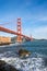 Surf in front of Golden Gate Bridge worldwide known symbol of California