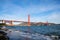 Surf in front of Golden Gate Bridge worldwide known symbol of California