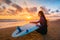 Surf girl and ocean. Beautiful young woman surfer girl with surfboard on a beach at sunset or sunrise.