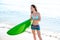 Surf girl with surfboard in beach shore