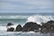 Surf hits rocks at Fogarty Creek Beach, Oregon Coast