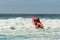 Surf rescue life savers training in progress. Rescue pick up at Wanda Beach, NSW, Australia