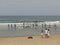 Surf school with children and teachers on the beach