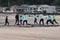 Surf school, a group of people are learning to surf in Chiba close to Ichinomiya.