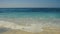 Surf on a tropical sand beach