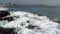 Surf waves running in the coastal rocks at the beach, Hampton, NH, USA