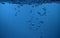 Surface Bubbles under Blue water background