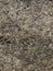 The surface of gray asphalt. Rough natural stone background
