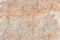 Surface of the marble with brown tint, stone texture and background. Imagination of the nature.