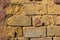 Surface of old porous tuff bricks
