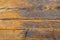 The surface of the old wooden boards with cracked varnish. Background from old shabby boards