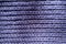 Surface of purple handmade rib knit fabric