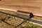 Surface roller in front of wooden benches