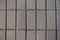 Surface of stack bond brick-like gray concrete pavement