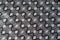 Surface of thick grey cotton fabric with diagonal geometric pattern