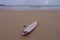 A surfboard on Gamboa Beach in Peniche Portugal