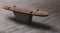 Surfboard shaped wooden bench in concrete base and concrete floor