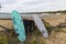 Surfboards in Al Cartello beach near Orbetello, Tuscany, Italy