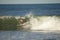 A surfer catching a wave, Durban