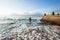 Surfer Entering Ocean Waves