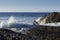 Surfer enters water off the rocks at Elephant Rock Gold Coast Australia