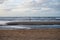 Surfer finished his training on cold water of North sea near Zandvoort in Netherlands