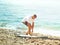 Surfer gets on a surf leash