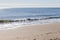 Surfer getting ready to ride the waves at Santa Cruz Beach