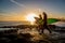 Surfer getting ready to surf on the coast of California.