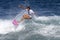 Surfer Girl Coco Ho Surfing in Haleiwa Hawaii