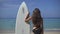 Surfer Girl Looking At Ocean