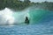 Surfer on green wave, Mentawai Islands, Indonesia