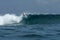 Surfer on perfect blue aquamarine wave, empty line up, perfect for surfing, clean water, Indian Ocean