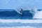 Surfer on perfect blue aquamarine wave, empty line up, perfect for surfing, clean water, Indian Ocean