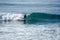 Surfer on perfect blue aquamarine wave, empty line up, perfect for surfing, clean water, Indian Ocean close to Mirissa