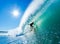 Surfer on Perfect Wave Getting Barreled