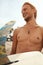 Surfer Portrait. Handsome Surfing Man With White Surfboard On Ocean Beach.