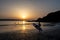 Surfer On Pwllgwaelod Beach And Dinas Head At The Wild Atlantic Coast Of Pembrokeshire In Wales, United Kingdom